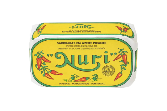 A tin of Nuri Spiced Sardinhas em Azeite Picante (spiced olive oil preserved fish) on a plain white background.